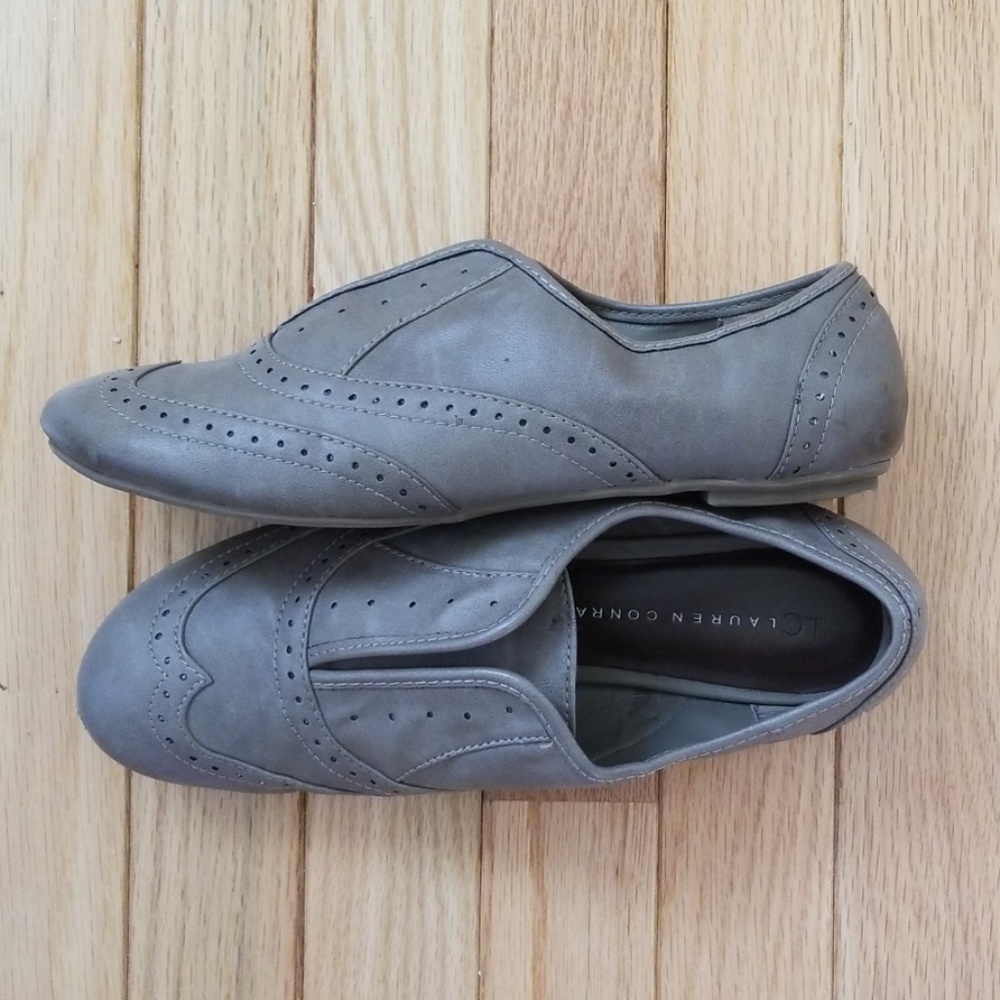 Grey brogue style flats